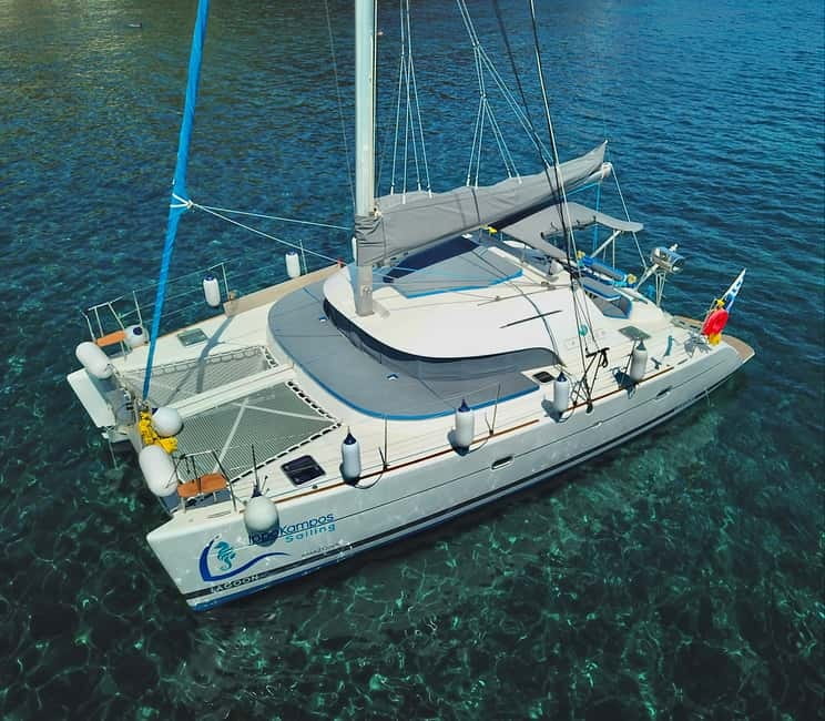 Santorini: Catamaran Cruise with Food and Drinks - Red Beach and White Beach: the dramatic views that set the mood fast
