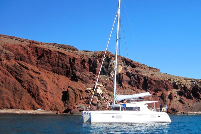 Santorini Catamaran Cruise with Fresh Meal and Open Bar - Sailing Past Akrotiri’s Venetian Lighthouse and the Caldera Landmarks You Cannot Reach Easily