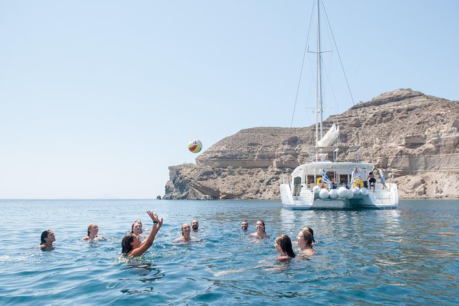 Santorini Catamaran Cruise with Fresh Meal and Open Bar - Deck Time, Swims, and Sea Conditions: The Practical Comfort Check