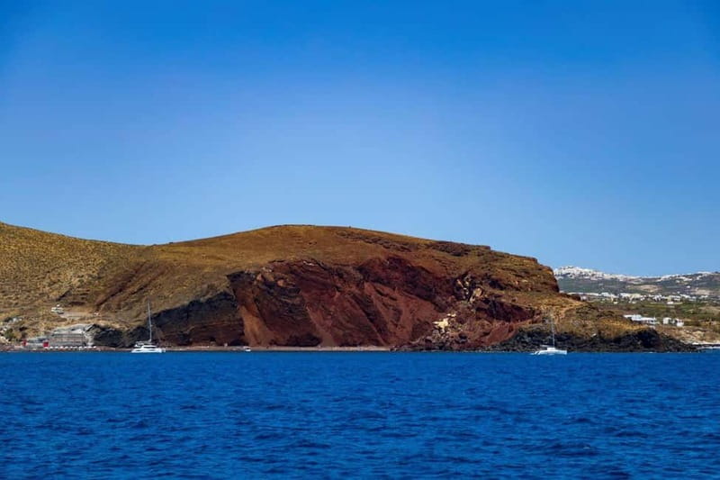 Santorini: Catamaran Cruise with Fresh Meal & Open Bar - Sailing past Red and White Beach, then choosing where to swim first