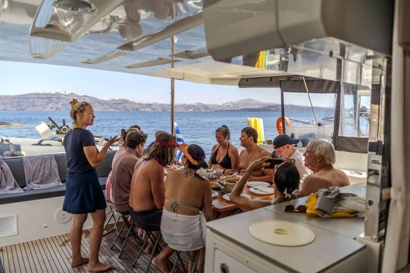 Santorini: Catamaran Cruise with Fresh Meal & Open Bar - Lunch or dinner on board: Greek comfort food plus open bar
