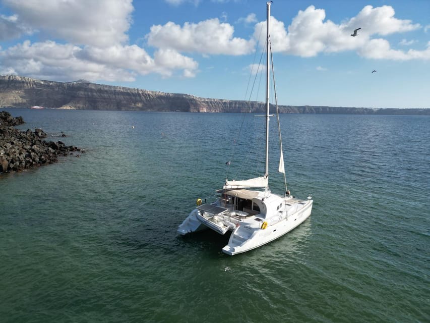 Santorini: Catamaran Cruise with Greek BBQ and Drinks - Red Beach: The Fast Hit of Santorini’s Most Distinctive Coast