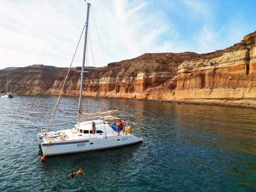 Santorini: Catamaran Cruise with Greek BBQ and Drinks - Boarding, Transfers, and the Meeting Point at NOTOS THERME & SPA