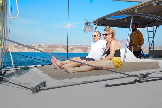 Santorini Catamaran Cruise with Greek Meal, Open-Bar and Sunset - On Board Comfort: Space, Restrooms, and Life Jackets