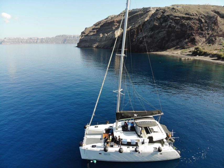 Santorini: Catamaran Cruise with Meal & Open Bar - Snorkeling gear, towels, and what to bring so you feel prepared