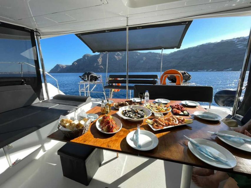 Santorini: Catamaran Cruise with Meal & Open Bar - The Santorini catamaran setup: comfortable, small, and easy to time