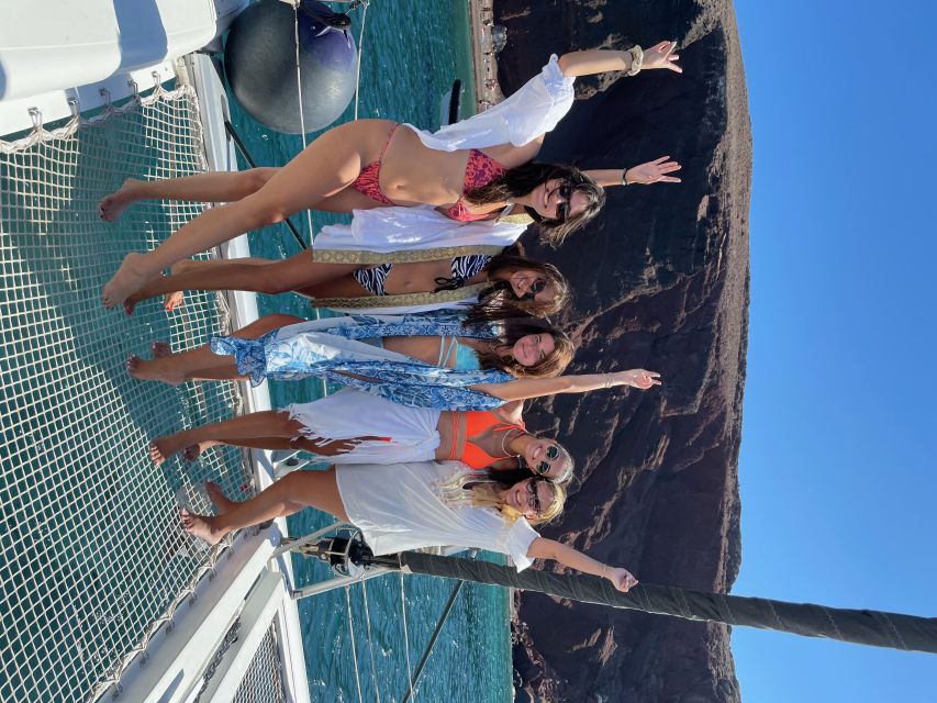 Santorini: Catamaran Cruise with Meal & Open Bar - Red Beach: volcanic color, real swim time, and snackable views