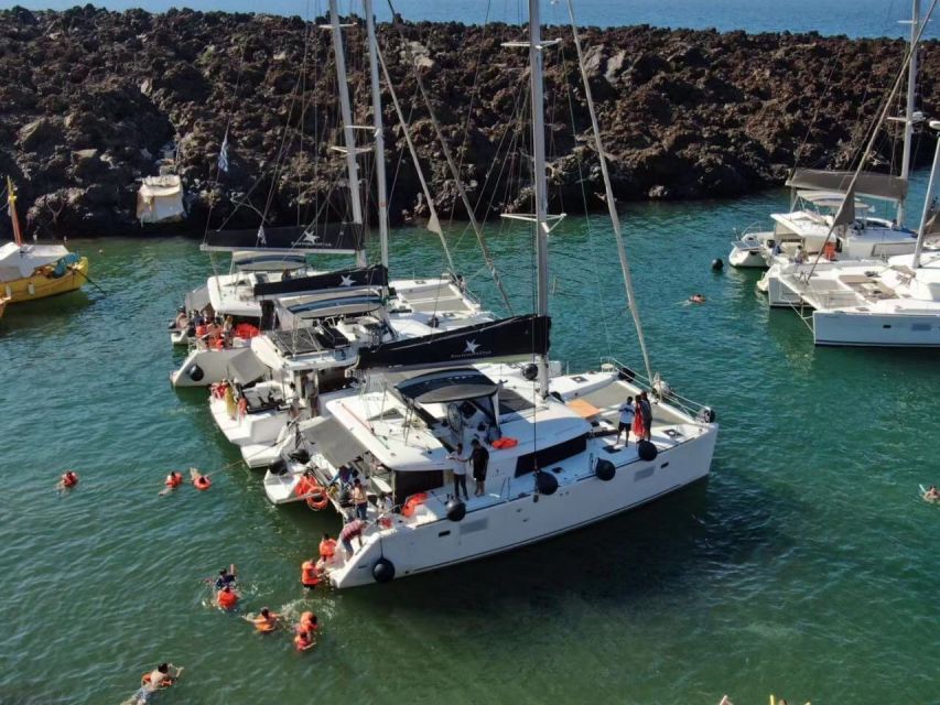 Santorini: Catamaran Cruise with Meal & Open Bar - White Beach and Black Beach moments: quick scenic stops that keep the day moving