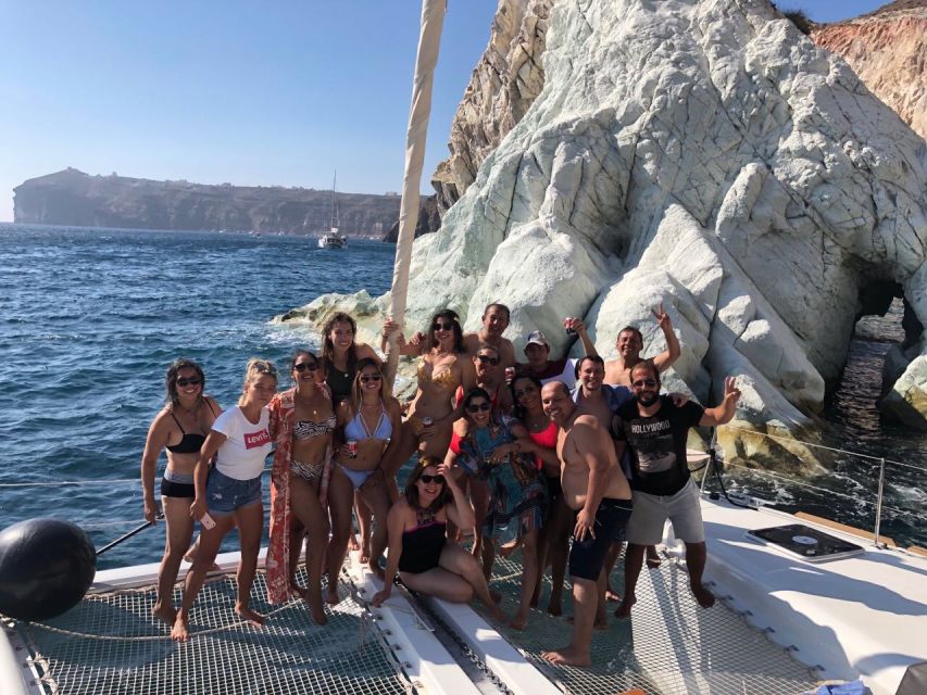 Santorini: Catamaran Cruise with Meal & Open Bar - Near the lighthouse and along the Caldera: why the boat route feels different
