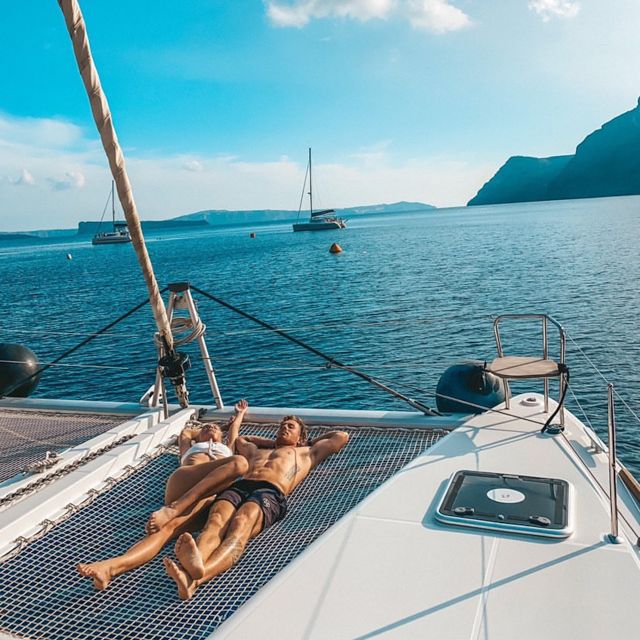 Santorini: Catamaran Cruise with Meal & Open Bar - Thirassia island: where you get the long swim window and the best food moment