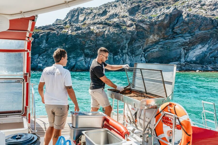 Santorini: Catamaran Tour with BBQ Dinner, Drinks, and Music - Stop 2: Red Beach swimming and snorkeling for 30 minutes