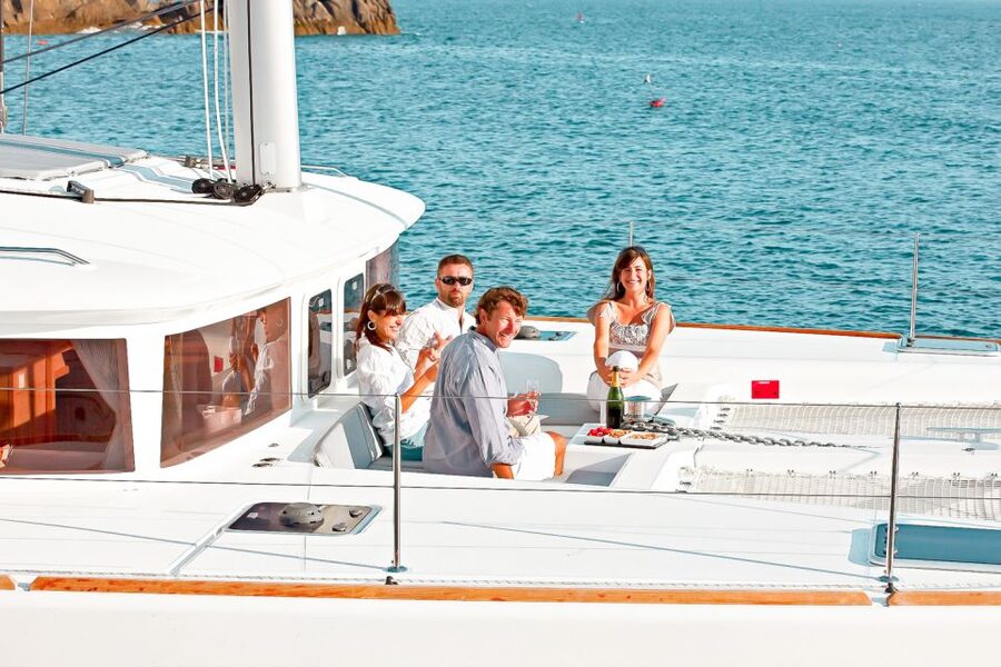 Santorini: Catamaran Tour with BBQ Meal and Unlimited Drinks - Why this Lagoon 450 catamaran day feels special in Santorini