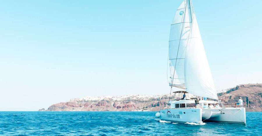 Santorini: Catamaran Tour with BBQ Meal and Unlimited Drinks - The hot springs swim: warm water plus big caldera views