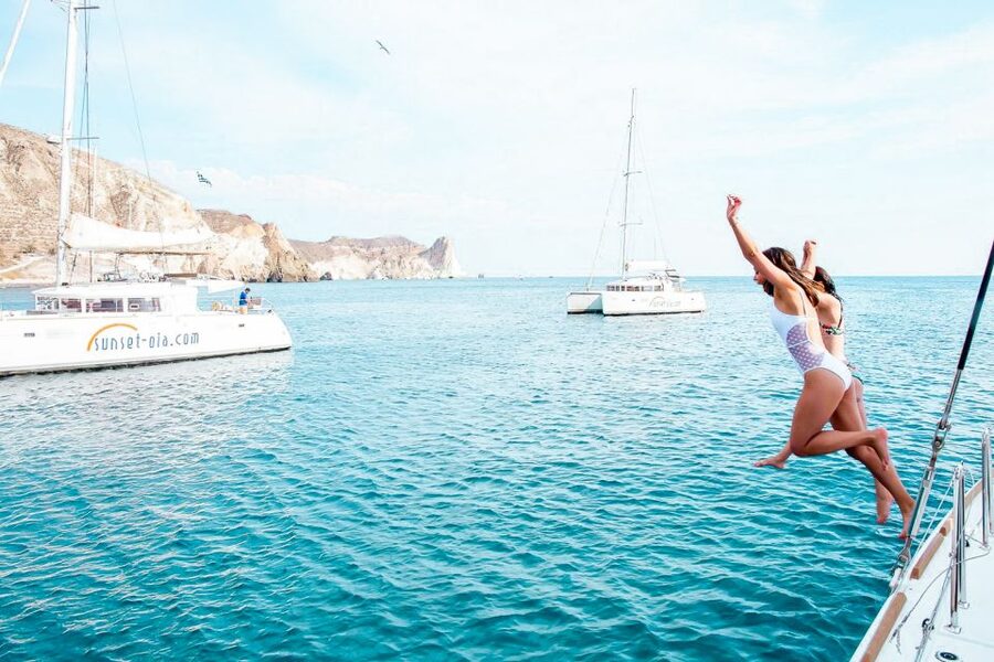 Santorini: Catamaran Tour with BBQ Meal and Unlimited Drinks - Red Beach snorkeling: practical gear, real water time