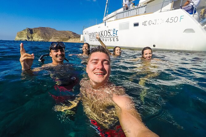 Santorini Classic Catamaran Cruise with BBQ, Drinks and Transfers - Onboard Comfort: Wind, Motion, and What to Pack