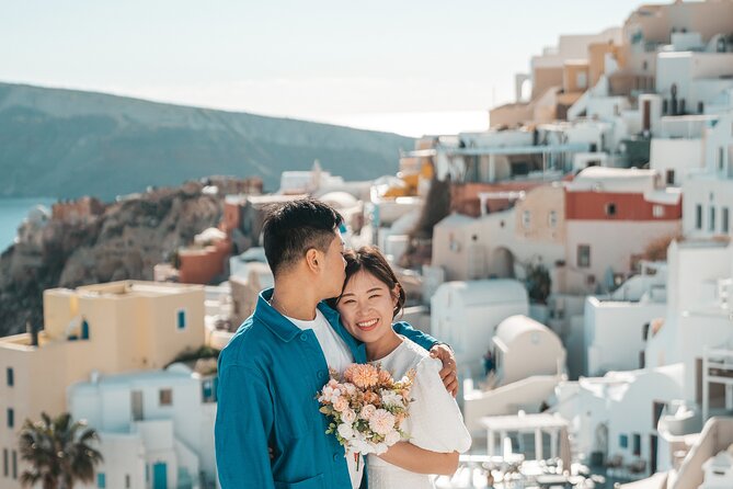 Santorini: Customized Private Photoshoot Walk in Oia - Iconic Oia shots you will frame: three blue domes, white streets, caldera views