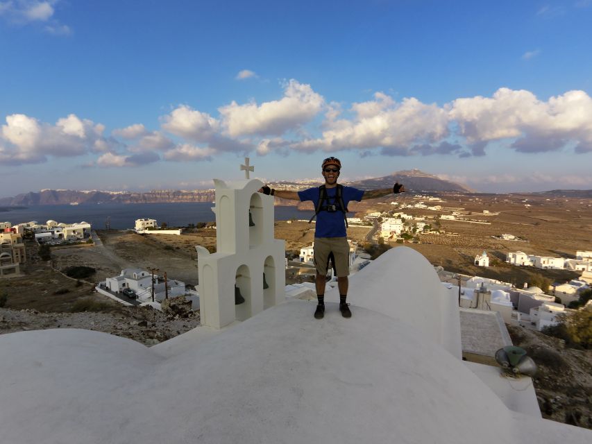 Santorini: Electric Mountain Bike Adventure - Emporeio maze village and the orange juice pit stop