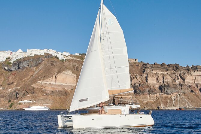 Santorini Gold Catamaran Cruise with BBQ, Drinks and Hotel Pickup - Red Beach and White Beach: the color show you can swim in