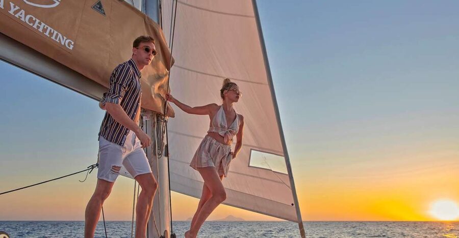 Santorini Gold Catamaran Cruise with Snorkel, BBQ & Open Bar - Red Beach Snorkel Stop: The Color Show Early On