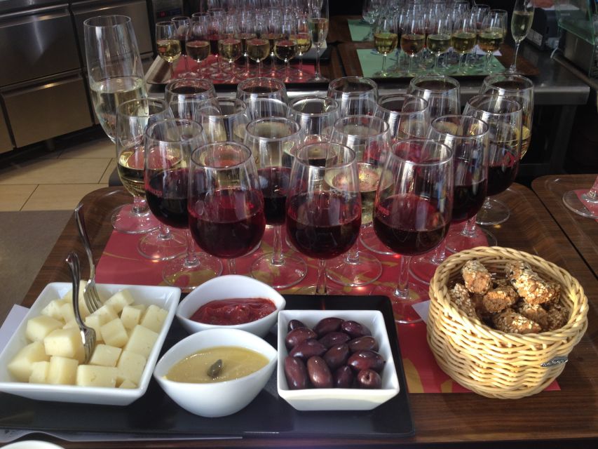 Santorini: Guided Tour to 3 Wineries with Wine Tastings - Stop 2: Art Space Winery, a creative vibe in the volcanic caves