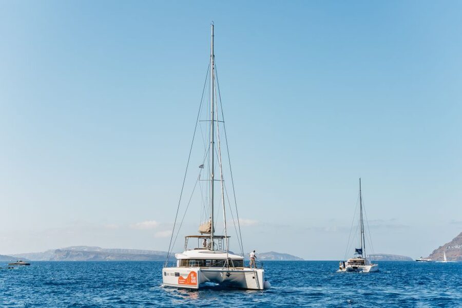 Santorini: Luxury Catamaran Day Trip with Meal and Open Bar - Luxury Santorini Views, Without the Whole-Island Commuting
