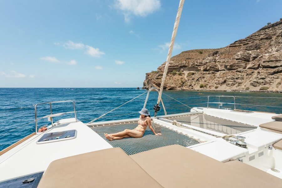 Santorini: Luxury Catamaran Day Trip with Meal and Open Bar - Red Beach Swim Stop: Why That First Jump Matters