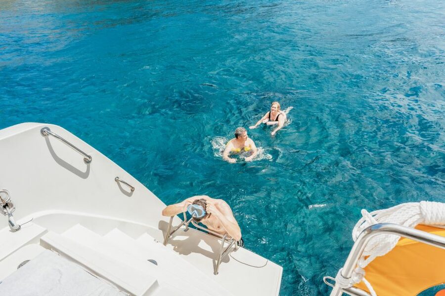 Santorini: Luxury Catamaran Day Trip with Meal and Open Bar - White Beach Sea Caves and Snorkeling: The Cool Factor
