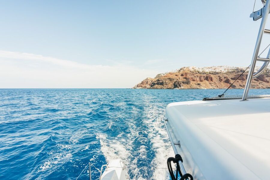 Santorini: Luxury Catamaran Day Trip with Meal and Open Bar - The Route: From Volcano Islands to Fira and Old Port Views