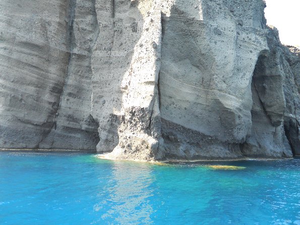 Santorini Luxury Catamaran Sunset Cruise with BBQ, Drink and Transfer - White Beach and the BBQ Lunch: When the Day Becomes a Meal