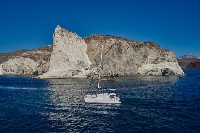 Santorini Oia: Luxury Sunset Cruise with Fresh Fish BBQ & Drinks - Getting there: pickup in Imerovigli vs meeting the office