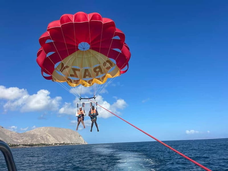 Santorini: Parasailing ExperiencePerissa,Perivolos,St.George - The Speedboat Ride and How They Get You Ready to Lift