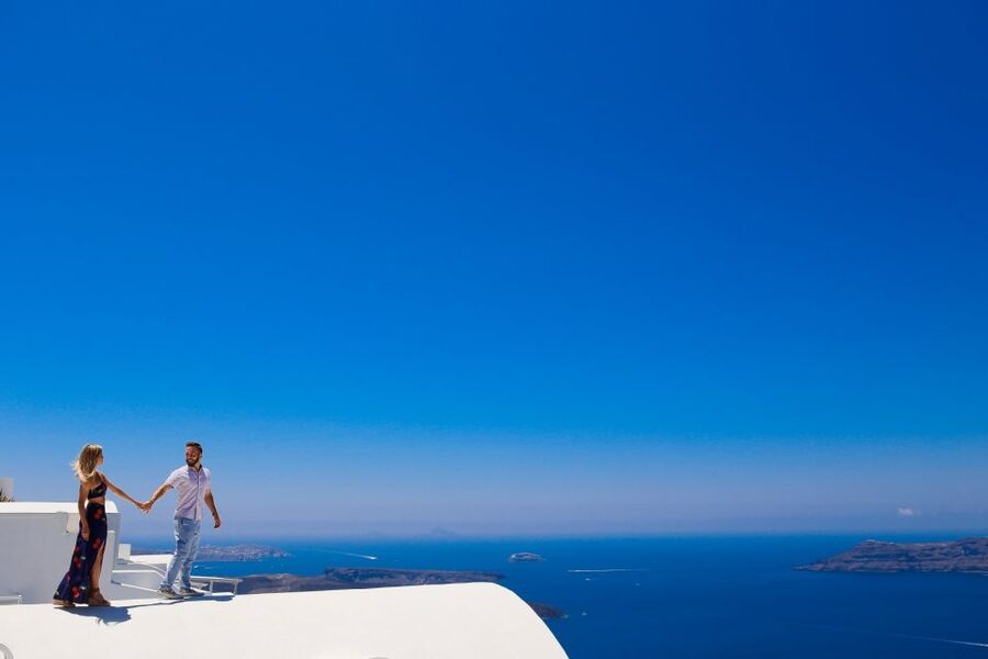 Santorini: Photo Shoot with a Private Vacation Photographer - Picking Locations on Santorini, From Oia Blue Domes to Quieter Caldera Views