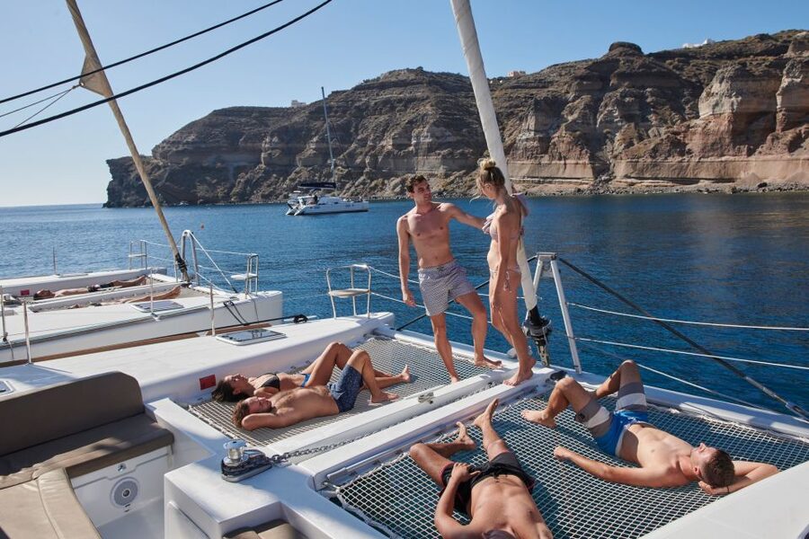 Santorini: Platinum Catamaran Cruise w/ BBQ Meal & Open Bar - Akrotiri, Caldera Passes, and the 18th-Century Lighthouse Moment