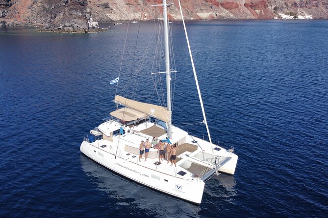 Santorini Platinum Catamaran Cruise with Meal, BBQ and Open Bar - Mesa Pigadia swimming stop: the clearest water break