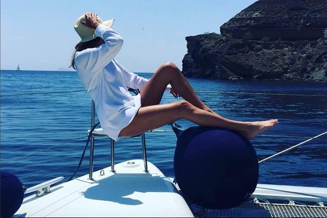 Santorini Platinum Catamaran Cruise with Meal, BBQ and Open Bar - Volcano hot springs: caves, volcanic beaches, and that “healing” story