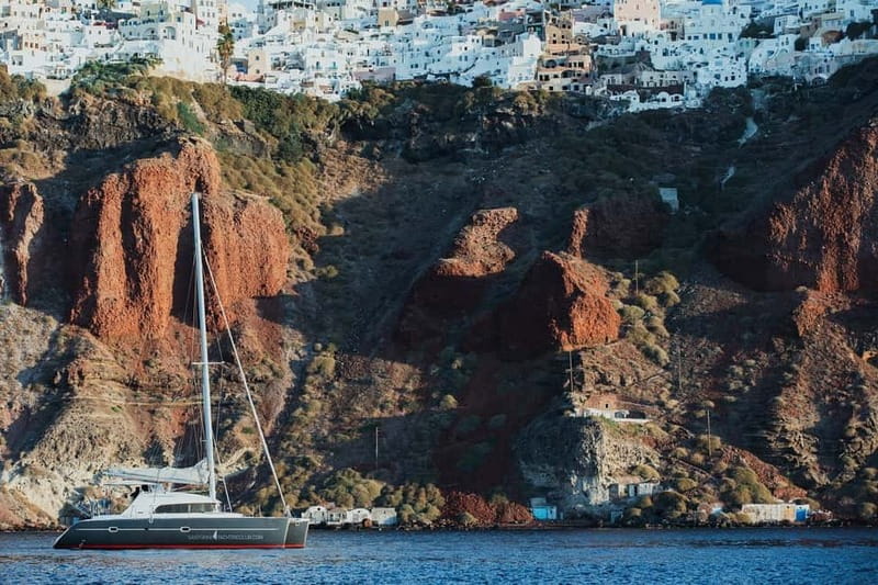 Santorini: Private Catamaran Cruise with BBQ Meal and Drinks - Getting on board: pickup, what to pack, and how the day runs