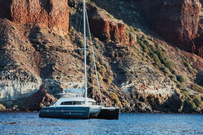Santorini: Private Catamaran Cruise with BBQ Meal and Drinks - Volcano hot springs: warmth, sulfur, and how to have the best swim