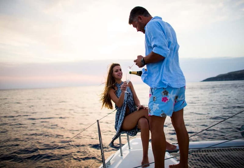 Santorini: Private Catamaran Cruise with BBQ Meal and Drinks - White Beach, Mesa Pigadia, and Red Beach stops you can actually enjoy