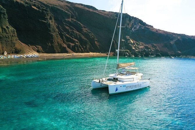 Santorini Private Catamaran Cruise with BBQ, Open Bar & Transfers - Palea Kameni hot springs: the natural spa moment