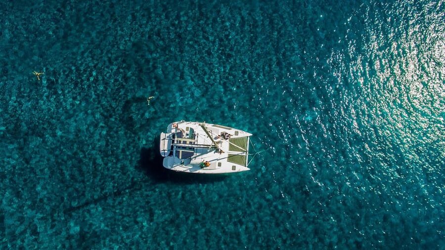 Santorini: Private Catamaran Cruise with Food & Drinks - Why a private Santorini catamaran cruise costs more, and why it can still be worth it