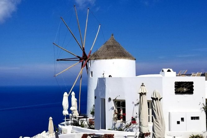 Santorini Private Driver: Explore Santorini - Port & Hotel Pickup - Lunch stop at a traditional spot: keep it simple and local