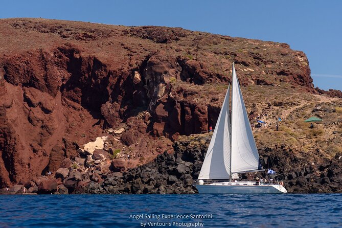 Santorini Private Sunset Sailing Tour with Dinner, Drinks &Transfer included - Between the volcanoes and the warm sulfur-water area