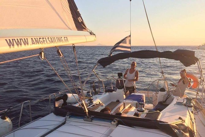 Santorini Private Sunset Sailing Tour with Dinner, Drinks &Transfer included - Thirassia swim time, eastward caldera views, and dinner in motion