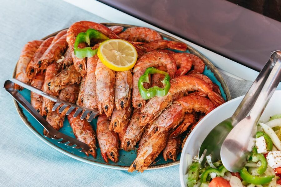 Santorini: Sailing Catamaran Cruise with BBQ and Drinks - Akrotiri Lighthouse to Palea Kameni hot springs, warm water and sulfur stops