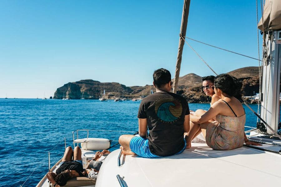 Santorini: Sailing Catamaran Cruise with BBQ and Drinks - Close volcano views and guided history while you still have energy