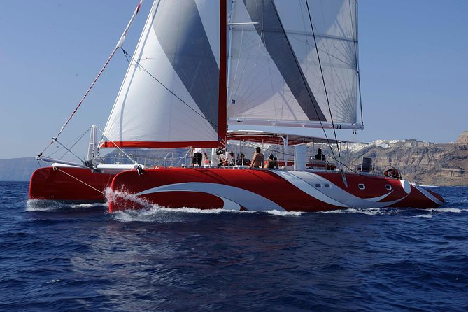 Santorini Sailing Dream Catcher with BBQ Lunch and Drinks - From your hotel to Vlichada or Ammoudi: the day starts easy