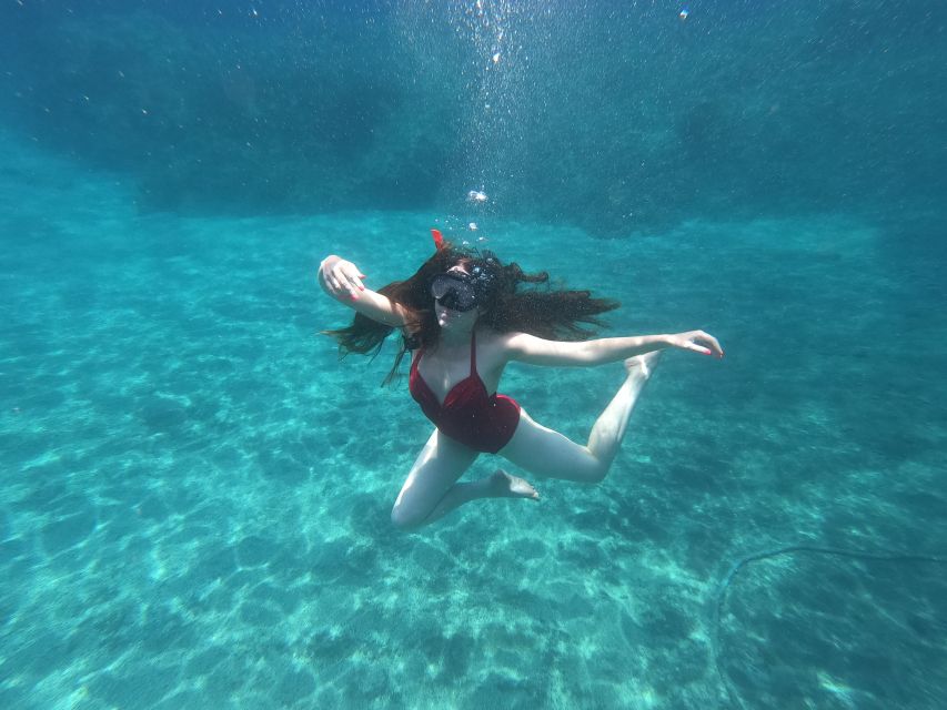 Santorini: Sea Caves Kayak Trip with Snorkeling and Picnic - Key highlights at a glance