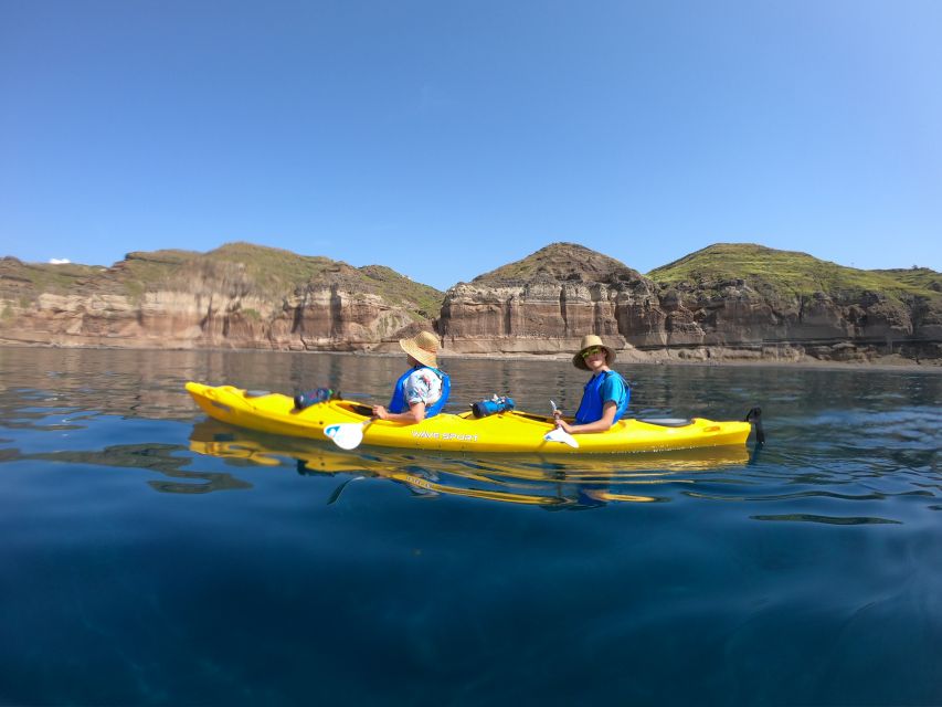 Santorini: Sea Caves Kayak Trip with Snorkeling and Picnic - Entering Santorini’s sea caves from the water