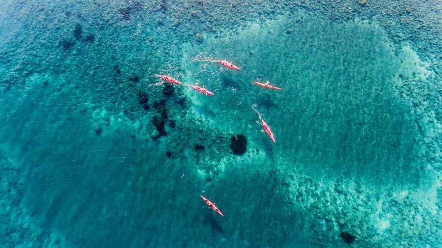 Santorini: Sea Kayaking with Light Lunch - Red Beach from the water: volcanic color you can feel