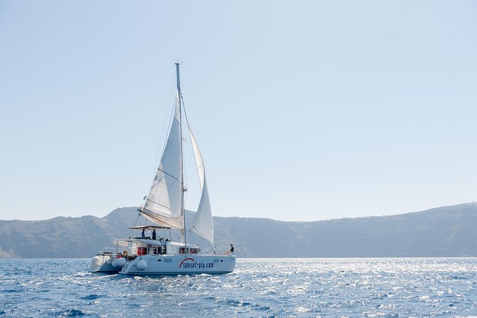 Santorini Small-Group Catamaran Sailing Trip(BBQ,drinks, transfer) - White Beach and onboard BBQ: an hour and a half you can actually savor